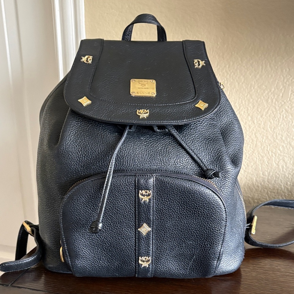 MCM Black Backpack with Gold Details